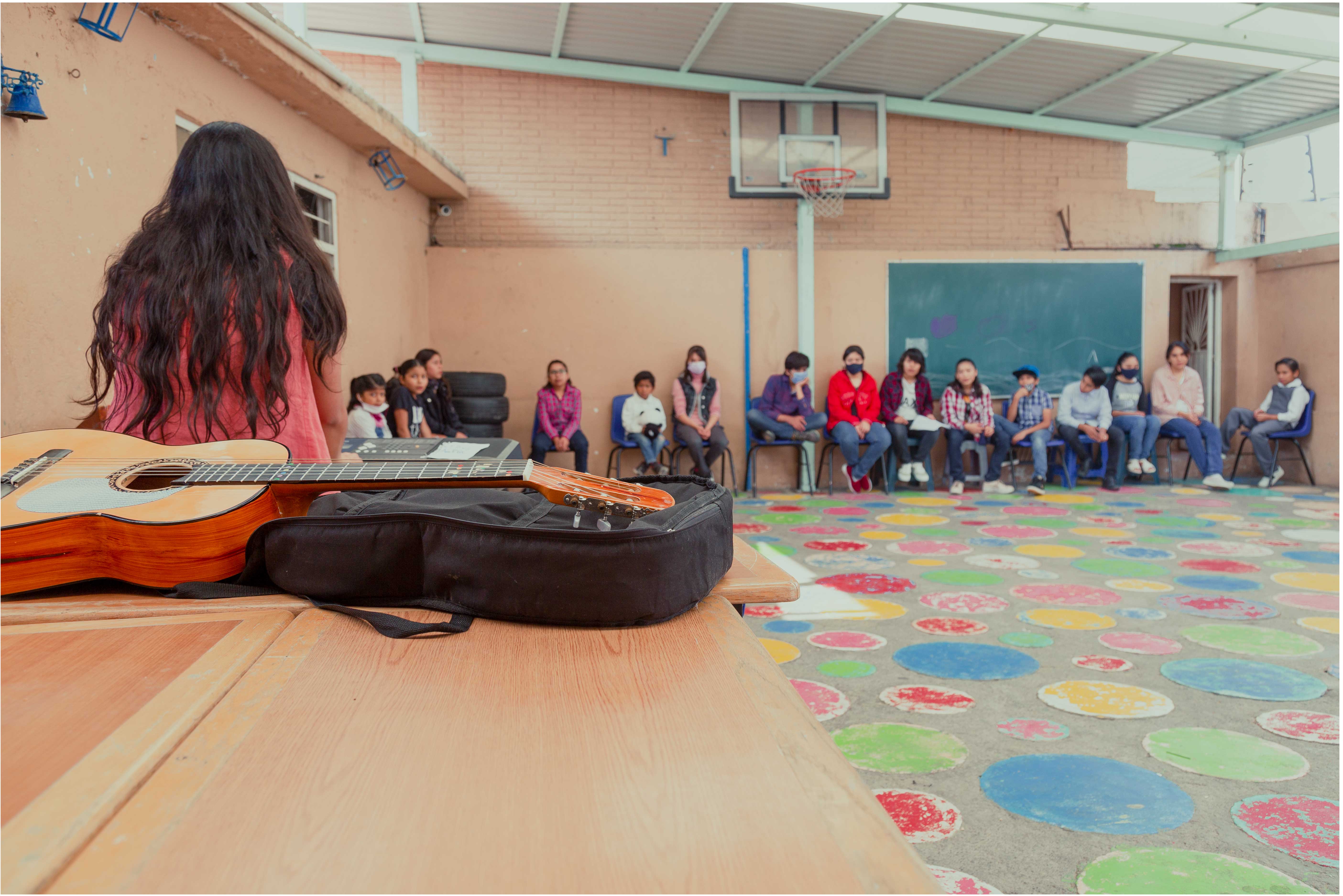 Children of the home in a music activity